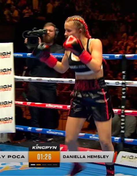 boxer that flashed crowd|OnlyFans star Daniella Hemsley flashes crowd celebrating boxing。